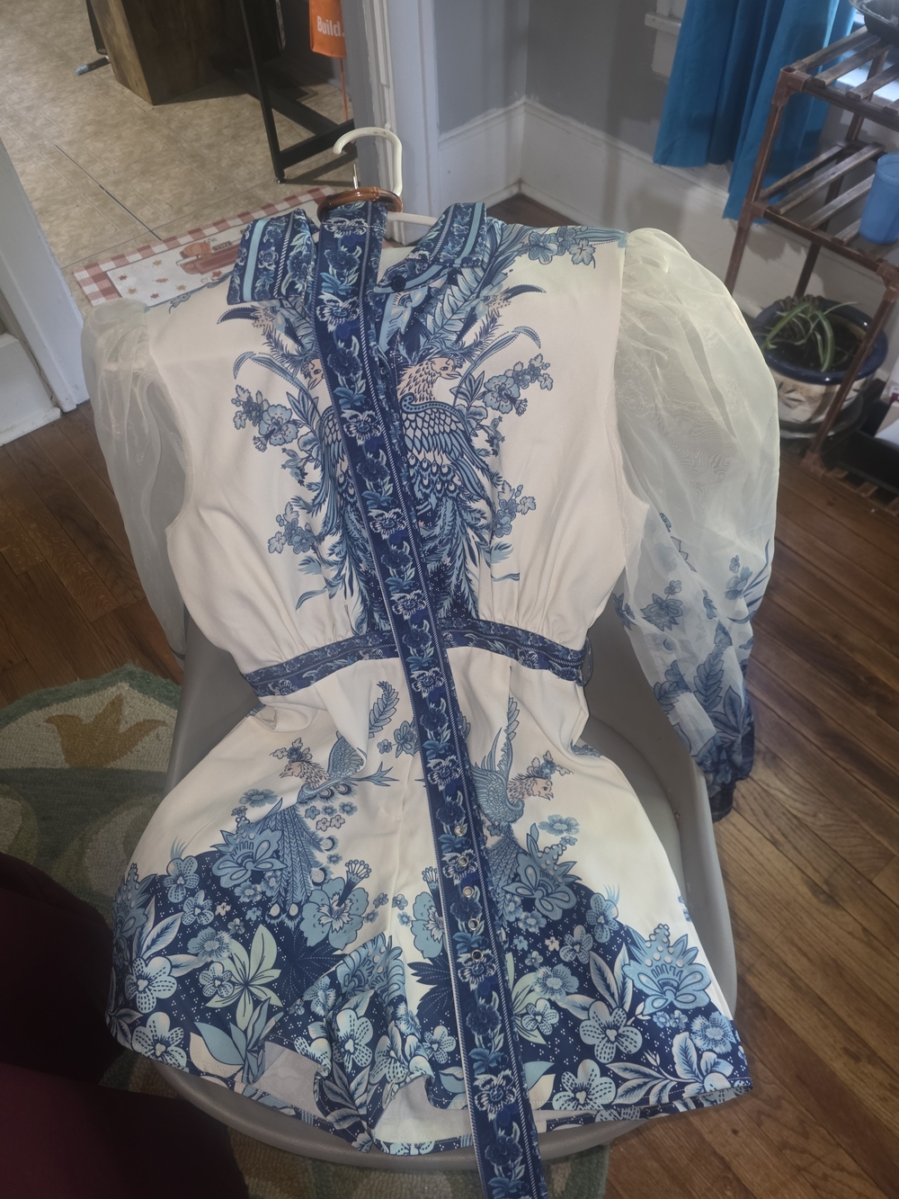 Fashion Nova Blue and White Floral Romper with Sheer Puff Sleeves
